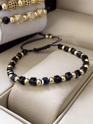 Bratara dama model deosebit cu margele aurii si negre simpla