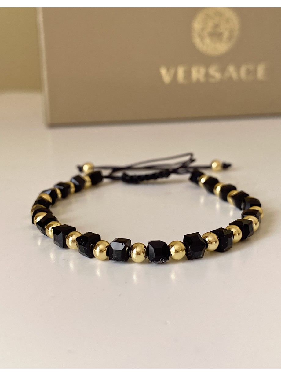 Bratara dama model deosebit cu margele aurii si negre simpla