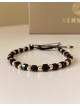 Bratara dama model deosebit cu margele aurii si negre simpla