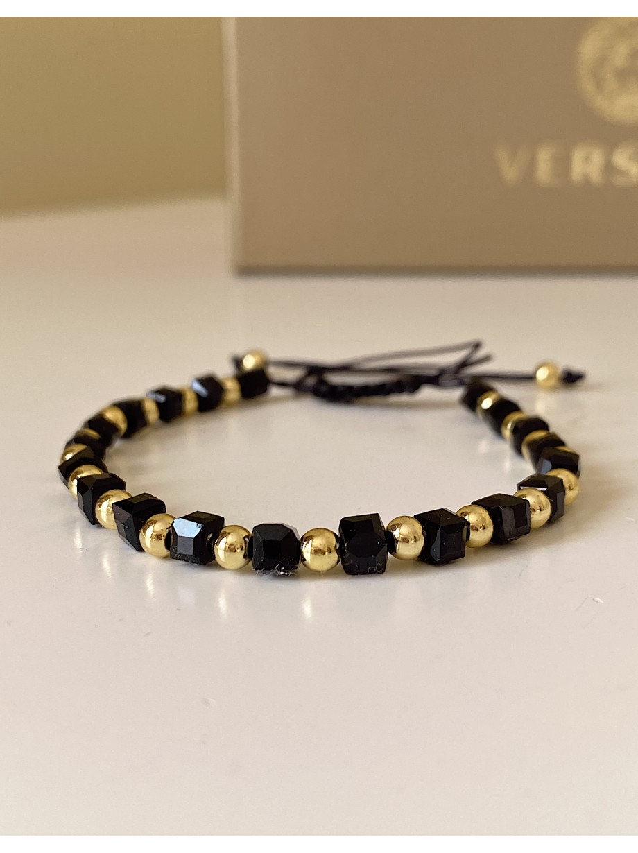Bratara dama model deosebit cu margele aurii si negre simpla