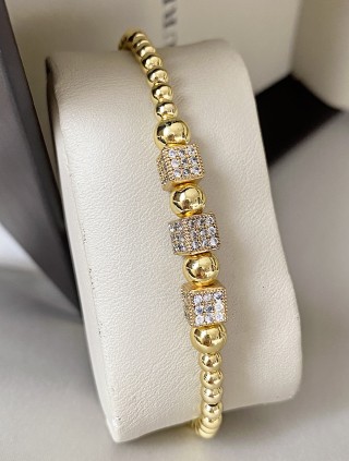 Bratara dama model deosebit cu margele aurii si patrate cu pietricele stralucitoare