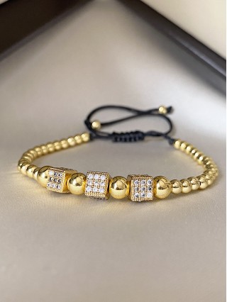 Bratara dama model deosebit cu margele aurii si patrate cu pietricele stralucitoare