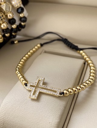Bratara dama model deosebit cu margele aurii si cruciulita cu pietricele stralucitoare