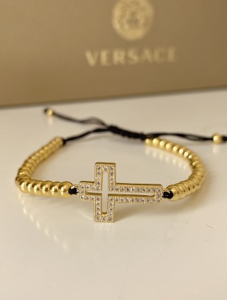 Bratara dama model deosebit cu margele aurii si cruciulita cu pietricele stralucitoare