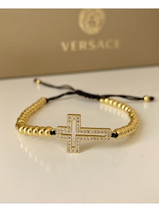 Bratara dama model deosebit cu margele aurii si cruciulita cu pietricele stralucitoare