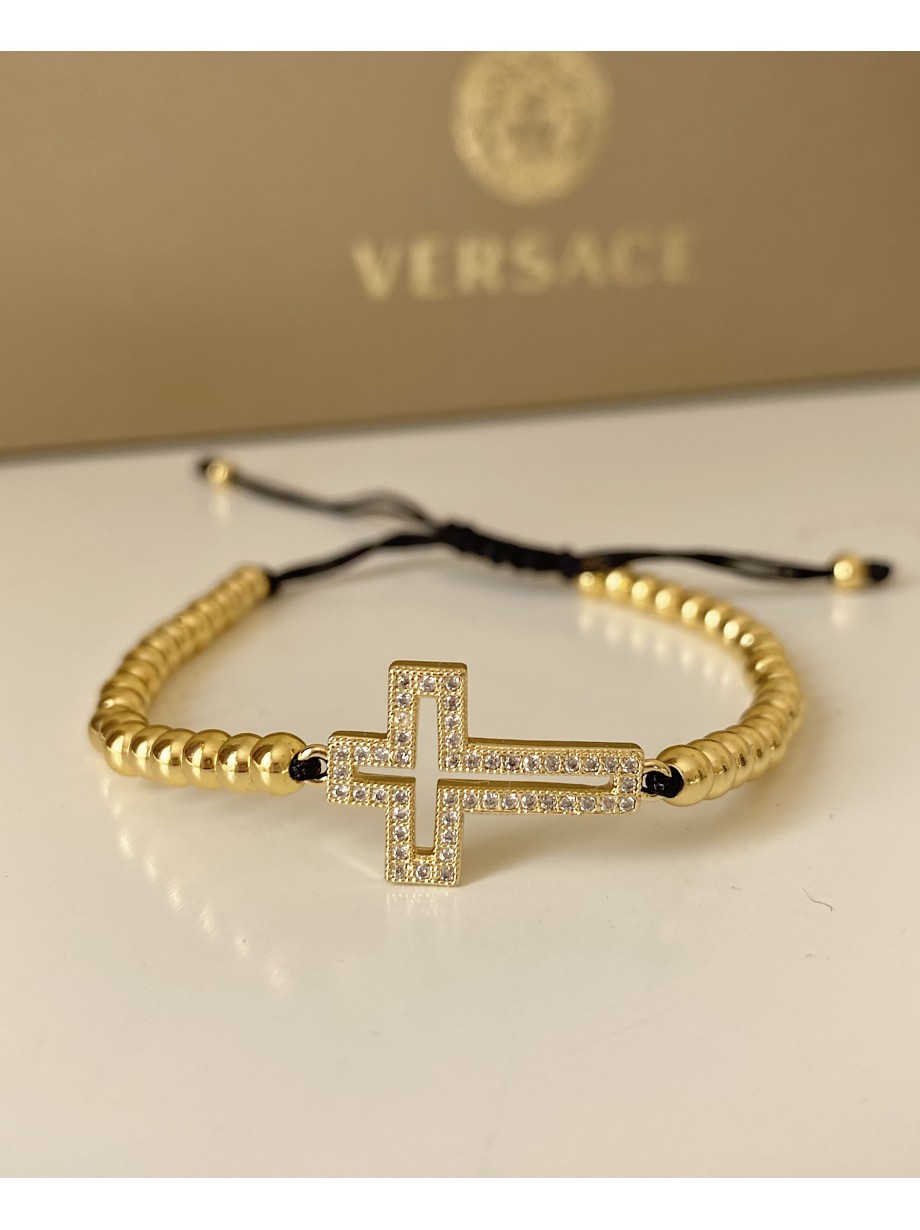 Bratara dama model deosebit cu margele aurii si cruciulita cu pietricele stralucitoare