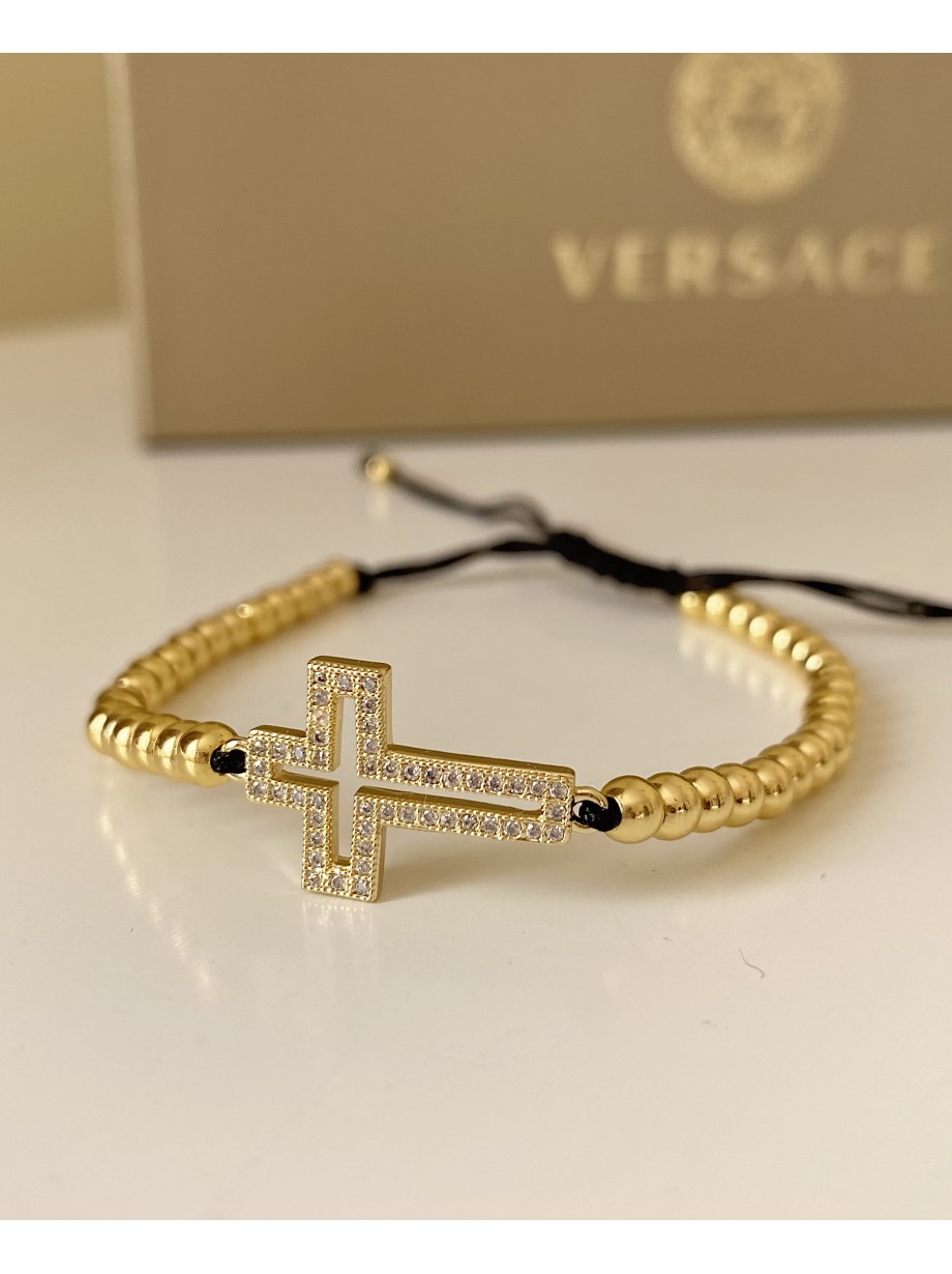 Bratara dama model deosebit cu margele aurii si cruciulita cu pietricele stralucitoare