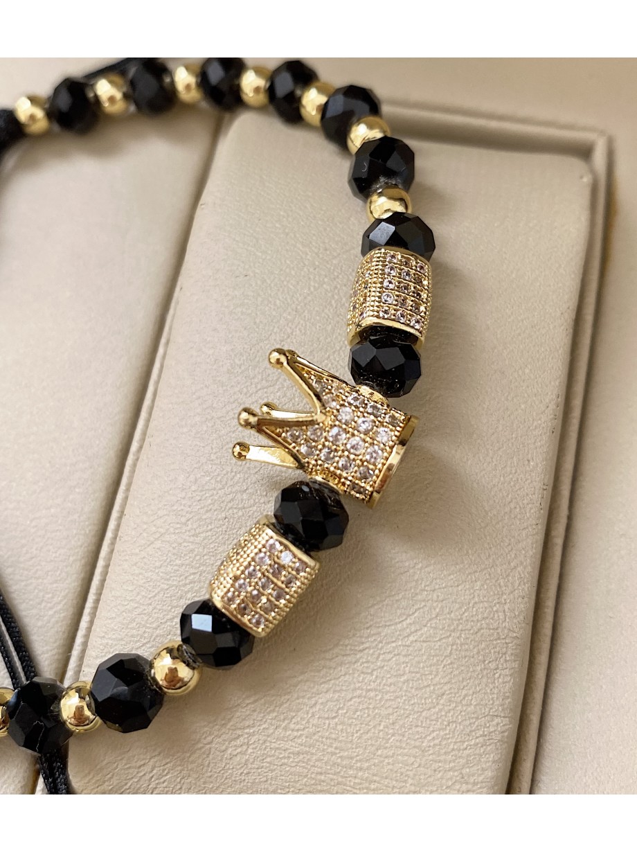Bratara dama model deosebit cu margele aurii si negre si coroana cu pietricele albe