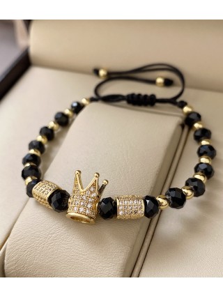 Bratara dama model deosebit cu margele aurii si negre si coroana cu pietricele albe