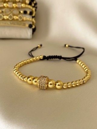 Bratara dama model deosebit cu margele aurii si cerc cu pietricele stralucitoare