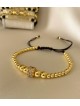 Bratara dama model deosebit cu margele aurii si cerc cu pietricele stralucitoare