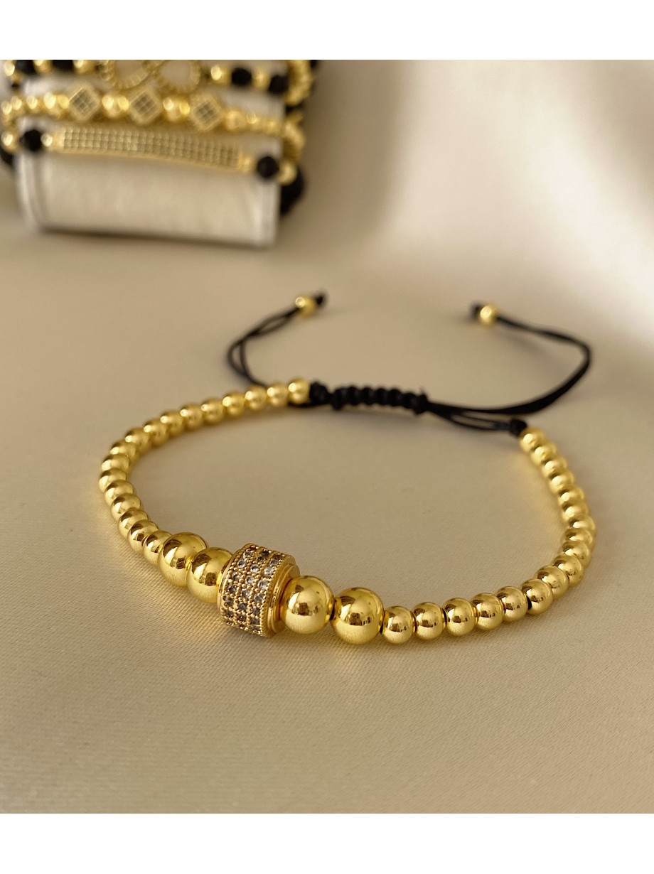 Bratara dama model deosebit cu margele aurii si cerc cu pietricele stralucitoare
