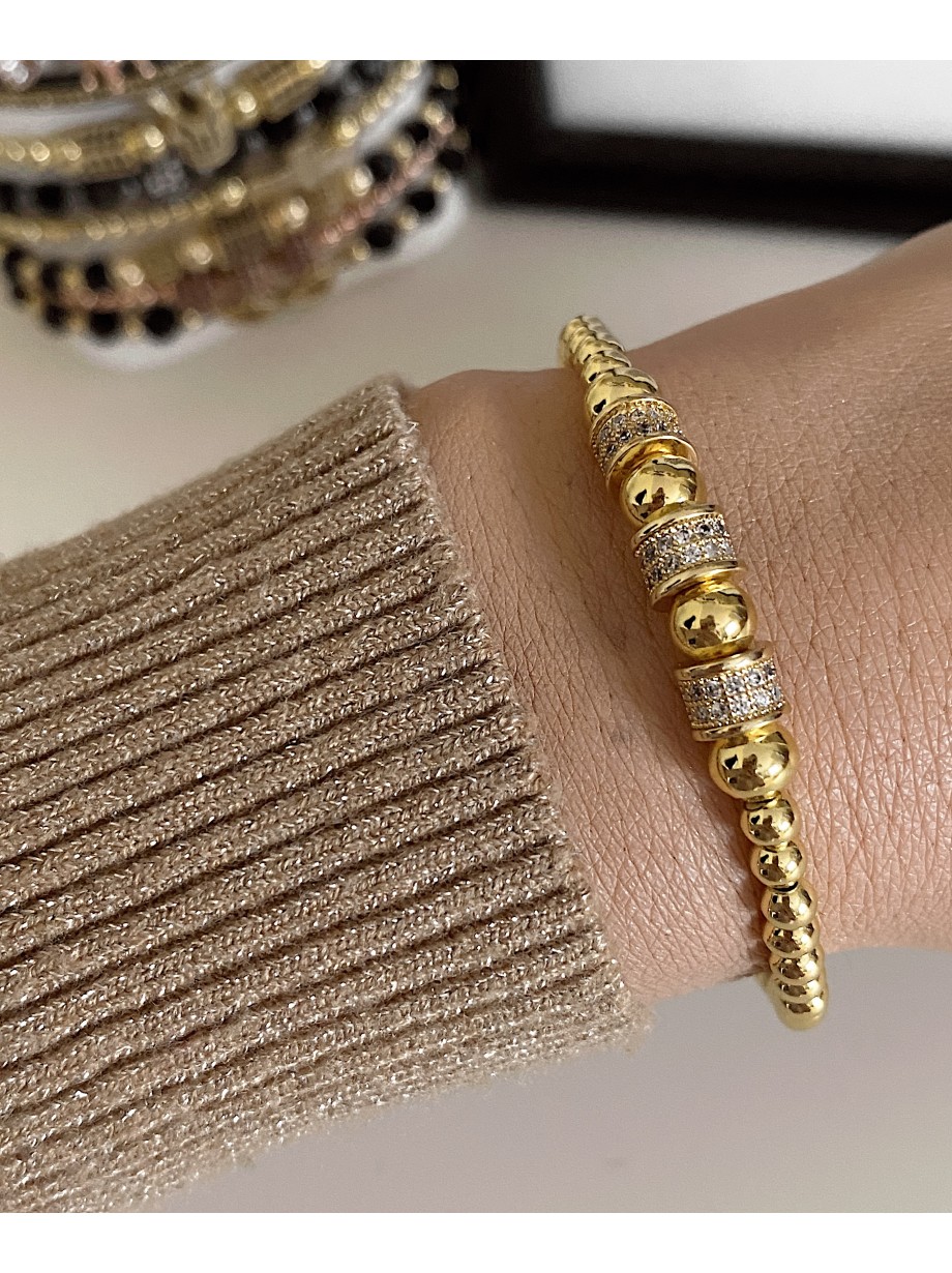 Bratara dama model deosebit cu margele aurii si cercuri cu pietricele stralucitoare