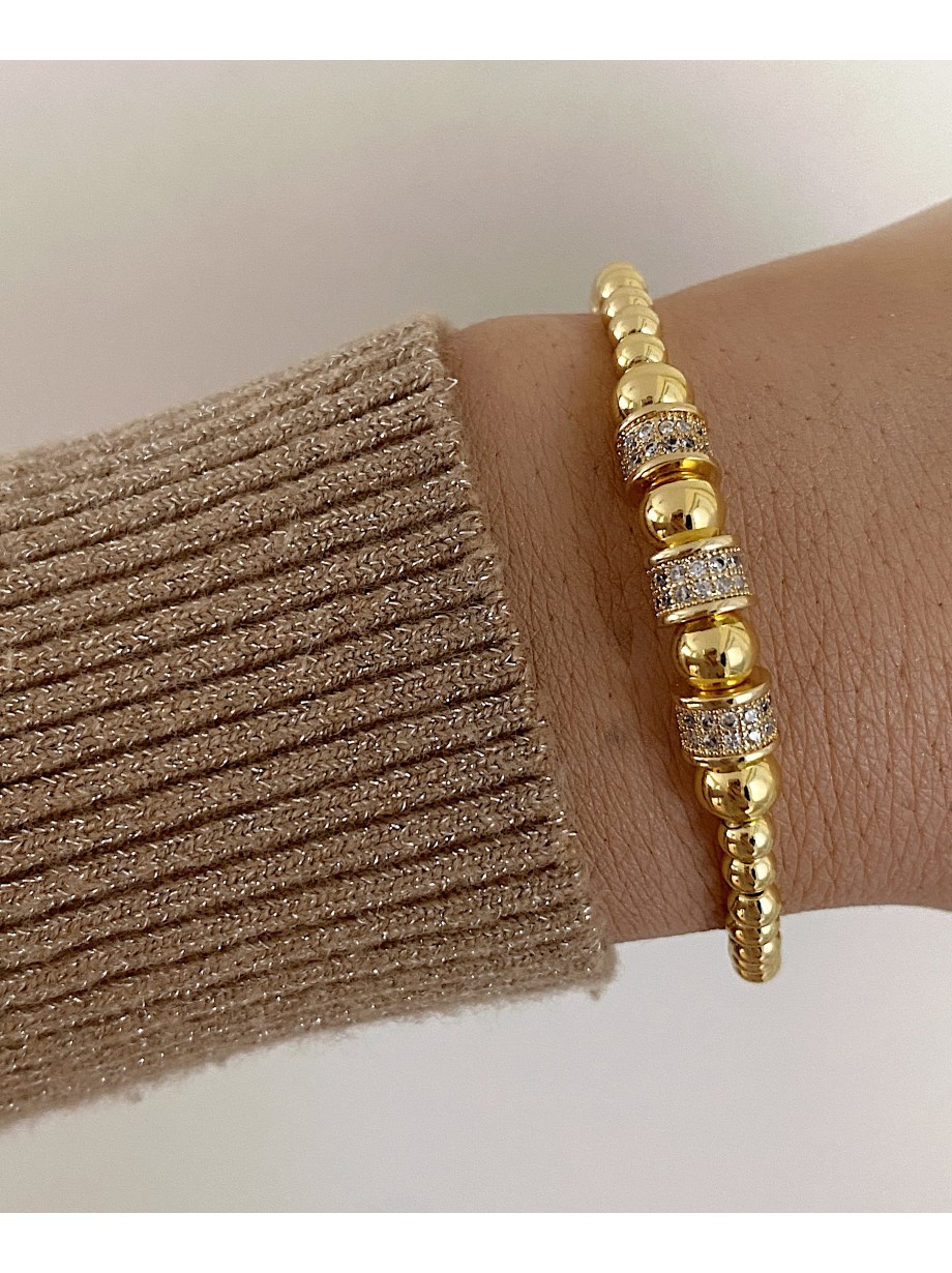 Bratara dama model deosebit cu margele aurii si cercuri cu pietricele stralucitoare