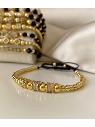 Bratara dama model deosebit cu margele aurii si cercuri cu pietricele stralucitoare