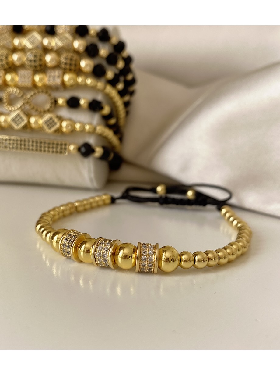 Bratara dama model deosebit cu margele aurii si cercuri cu pietricele stralucitoare
