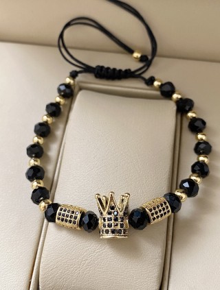 Bratara dama model deosebit cu margele aurii si negre si coroana cu pietricele negre