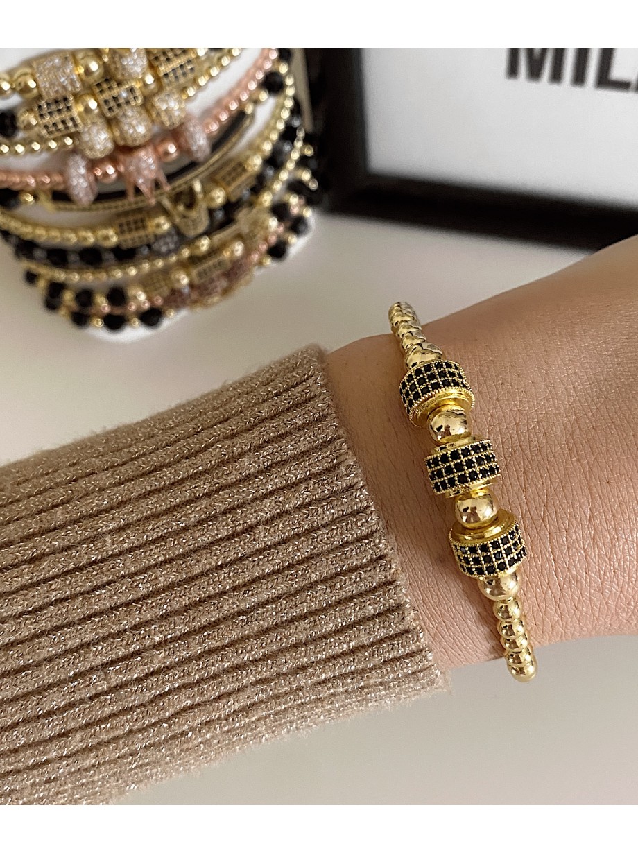 Bratara dama model deosebit cu margele aurii si cercuri cu pietricele negre
