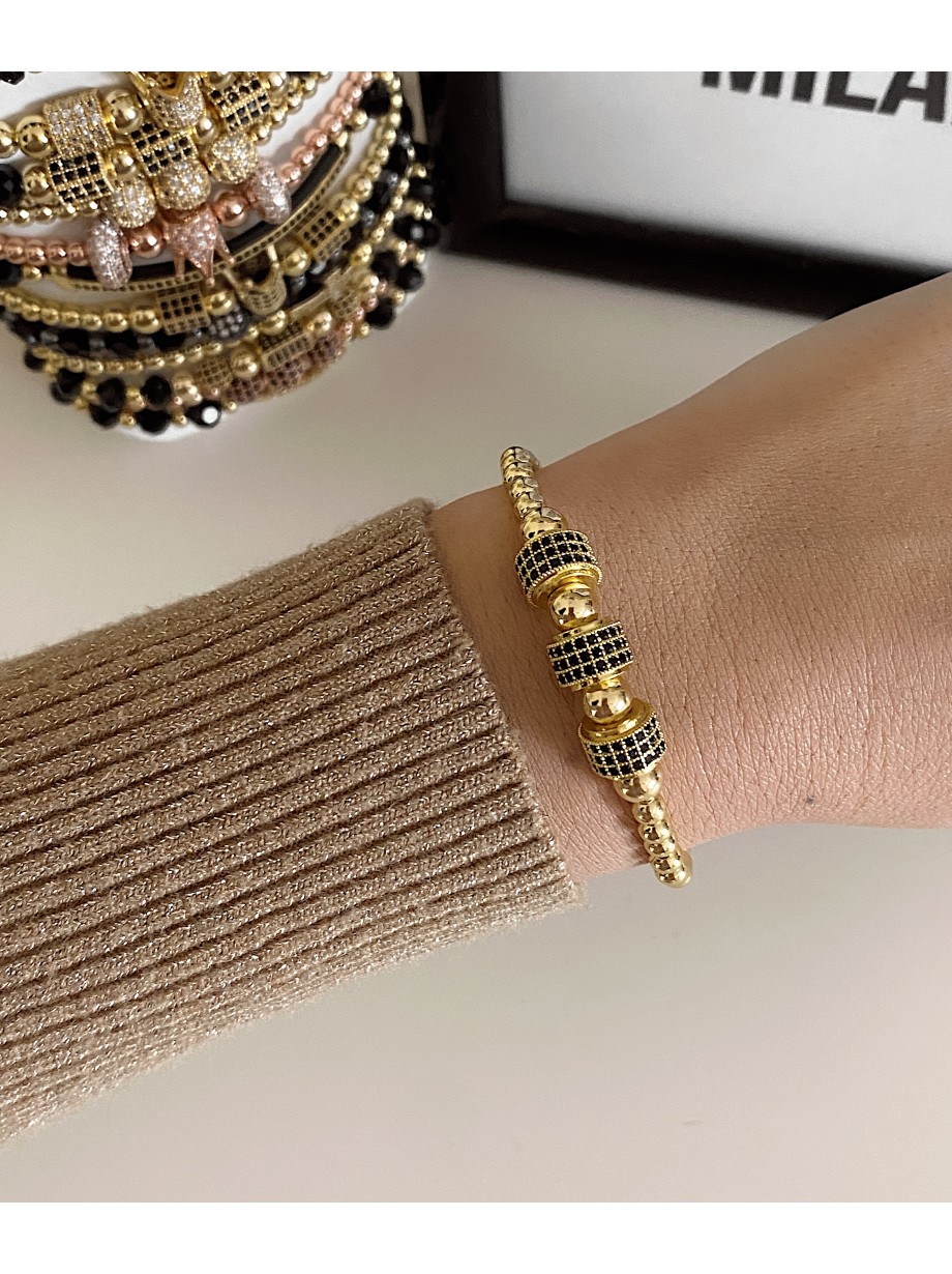 Bratara dama model deosebit cu margele aurii si cercuri cu pietricele negre