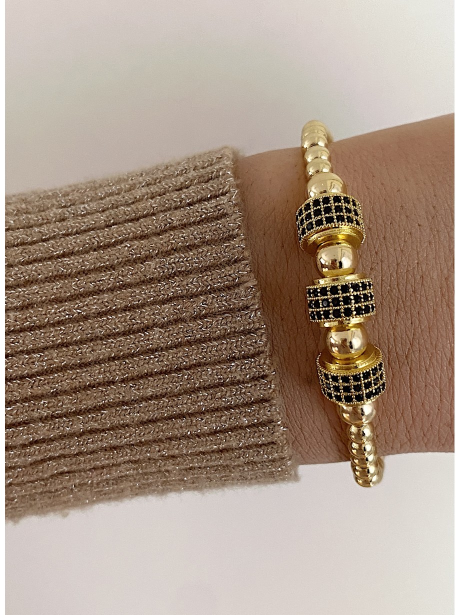 Bratara dama model deosebit cu margele aurii si cercuri cu pietricele negre