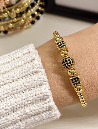 Bratara dama model deosebit cu margele aurii si forme cu pietricele negre