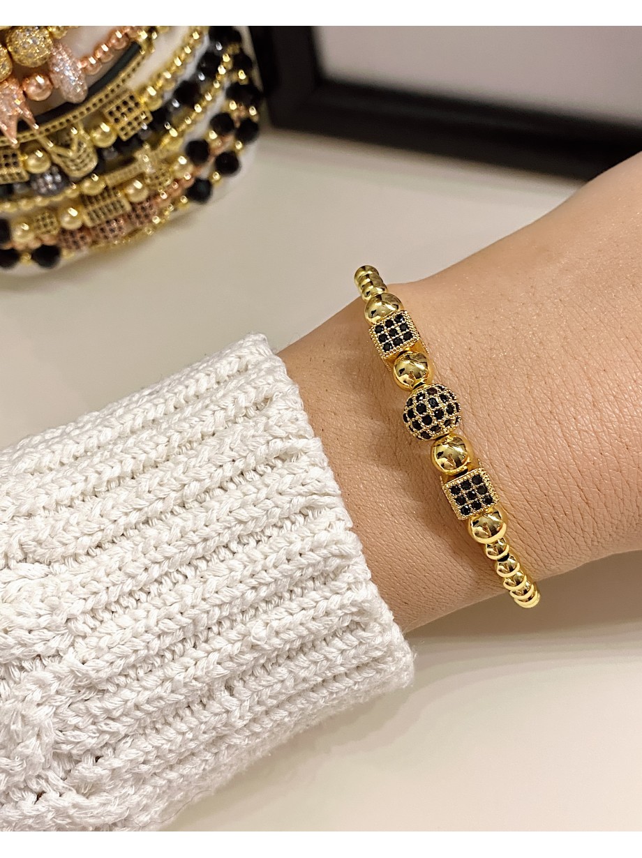 Bratara dama model deosebit cu margele aurii si forme cu pietricele negre