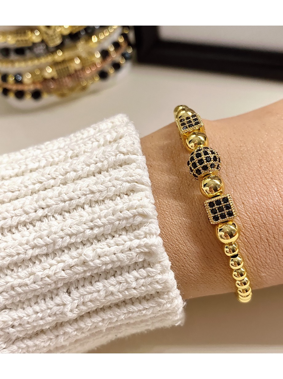 Bratara dama model deosebit cu margele aurii si forme cu pietricele negre