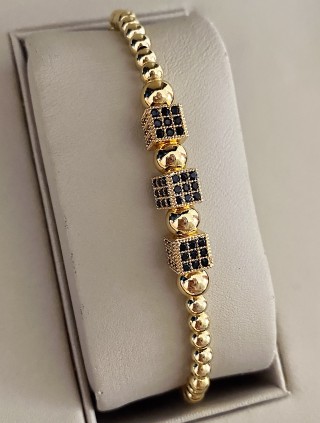 Bratara dama model deosebit cu margele aurii si patrate cu pietricele negre