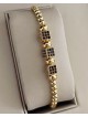 Bratara dama model deosebit cu margele aurii si patrate cu pietricele negre