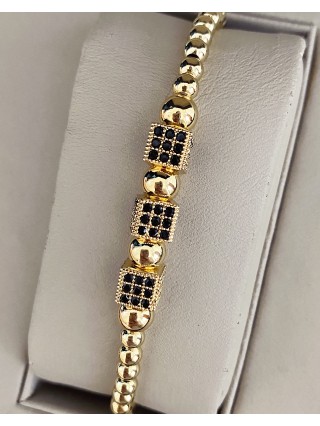 Bratara dama model deosebit cu margele aurii si patrate cu pietricele negre