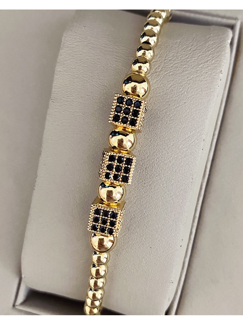 Bratara dama model deosebit cu margele aurii si patrate cu pietricele negre
