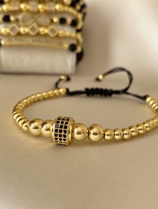 Bratara dama model deosebit cu margele aurii si cerc cu pietricele negre