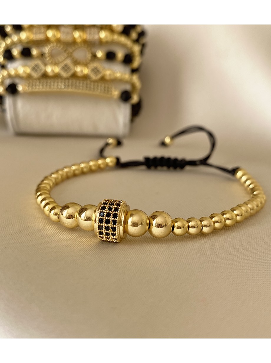 Bratara dama model deosebit cu margele aurii si cerc cu pietricele negre