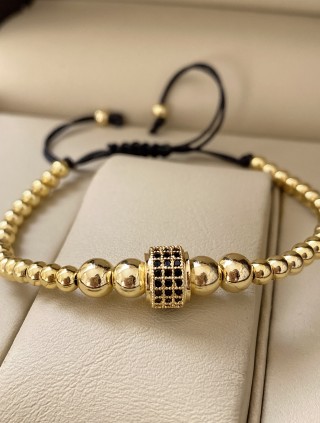 Bratara dama model deosebit cu margele aurii si cerc cu pietricele negre