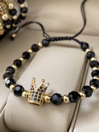 Bratara dama model deosebit cu margele aurii si negre si coroana cu pietricele negre