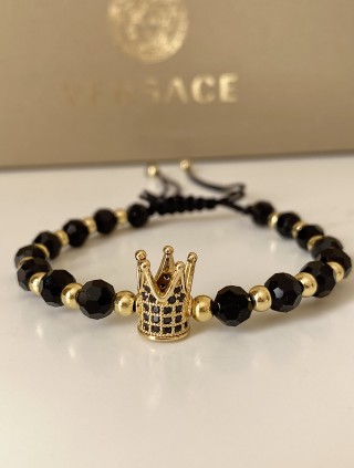 Bratara dama model deosebit cu margele aurii si negre si coroana cu pietricele negre