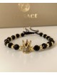 Bratara dama model deosebit cu margele aurii si negre si coroana cu pietricele negre