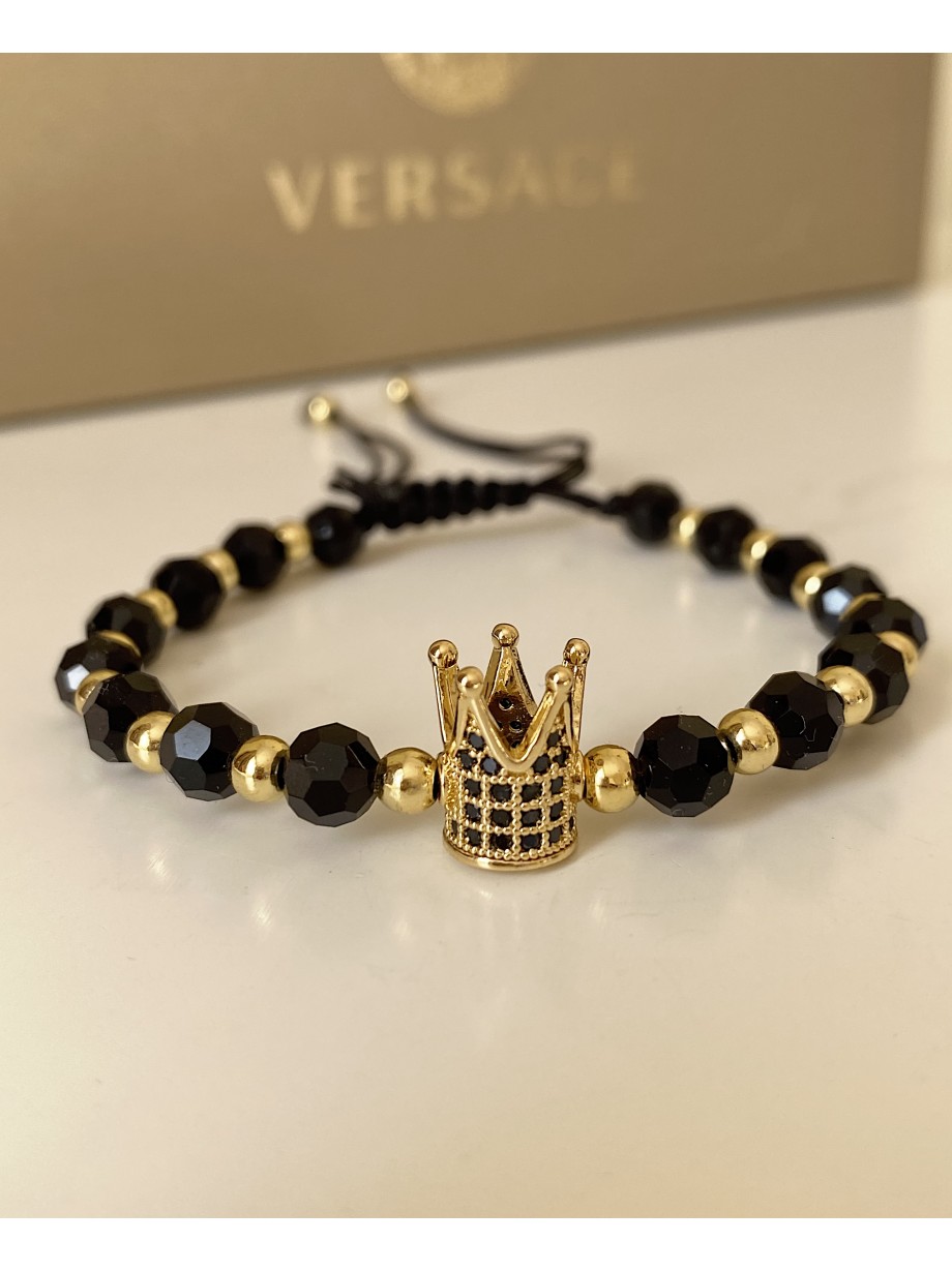 Bratara dama model deosebit cu margele aurii si negre si coroana cu pietricele negre