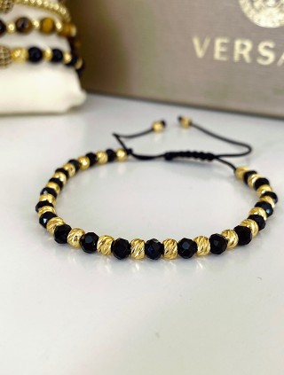 Bratara dama model deosebit cu margele aurii si negre simpla