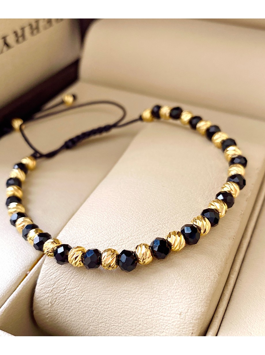 Bratara dama model deosebit cu margele aurii si negre simpla