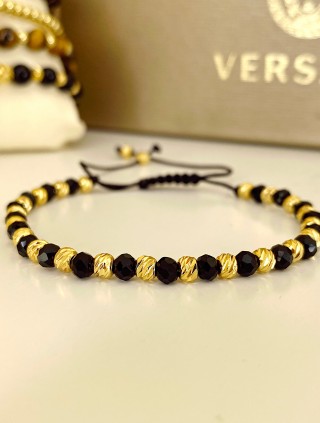 Bratara dama model deosebit cu margele aurii si negre simpla