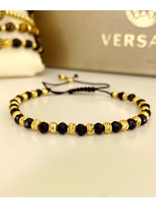 Bratara dama model deosebit cu margele aurii si negre simpla