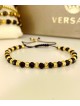 Bratara dama model deosebit cu margele aurii si negre simpla