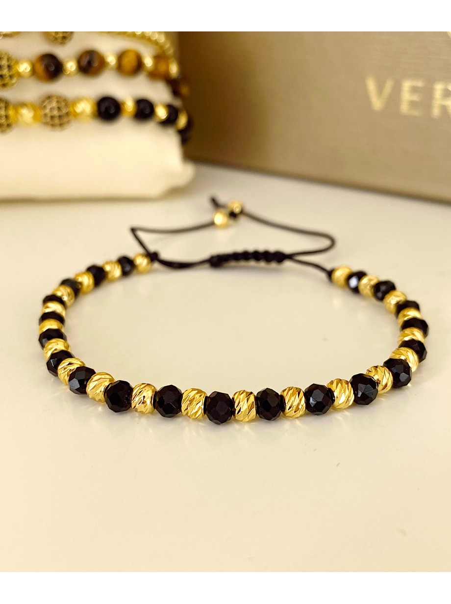 Bratara dama model deosebit cu margele aurii si negre simpla