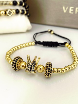 Bratara dama model deosebit cu margele aurii si coroana cu pietricele negre