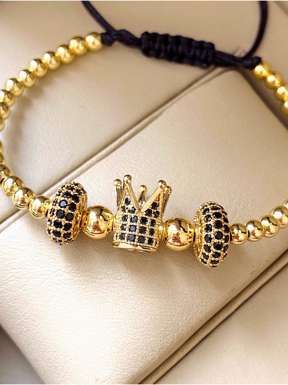 Bratara dama model deosebit cu margele aurii si coroana cu pietricele negre