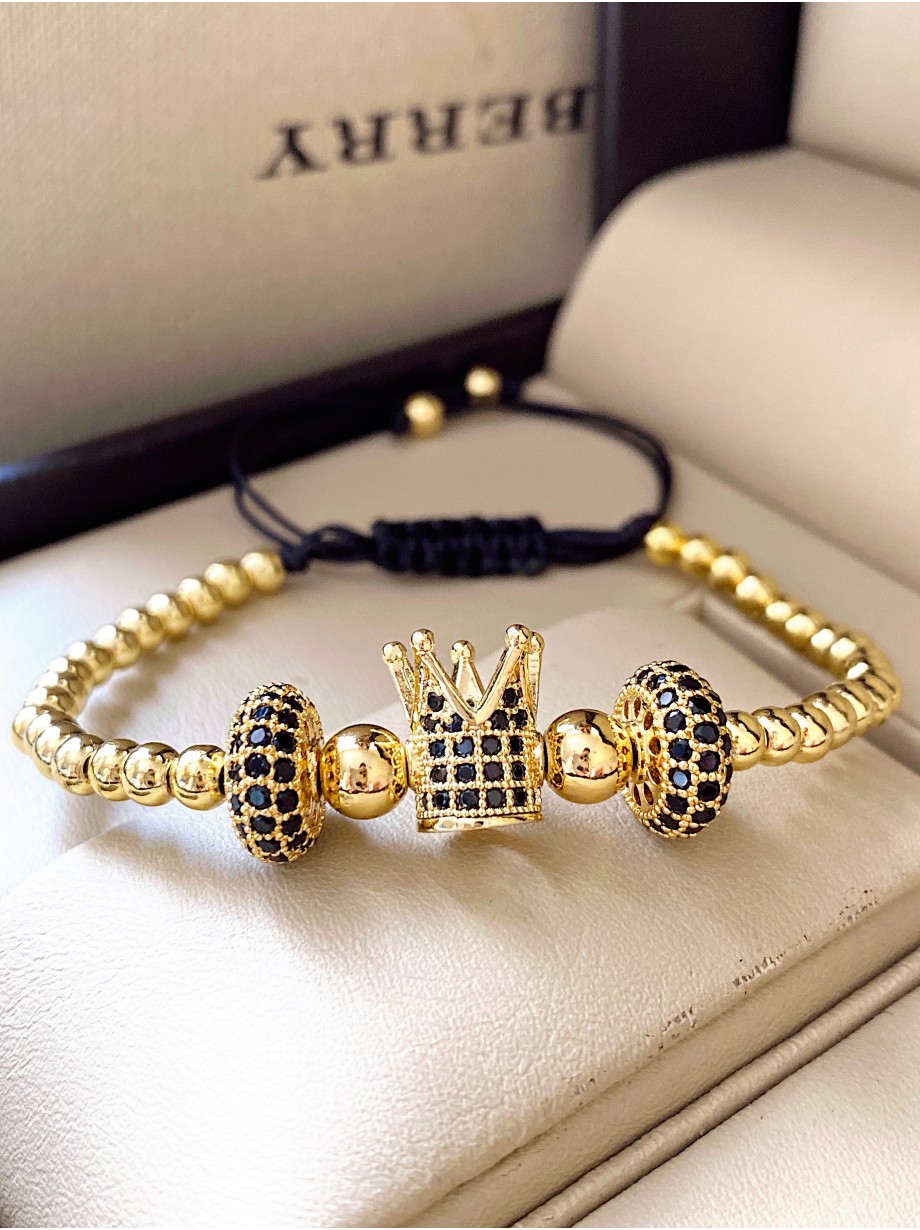 Bratara dama model deosebit cu margele aurii si coroana cu pietricele negre
