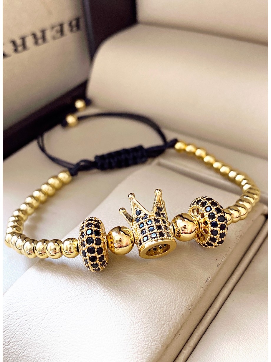 Bratara dama model deosebit cu margele aurii si coroana cu pietricele negre