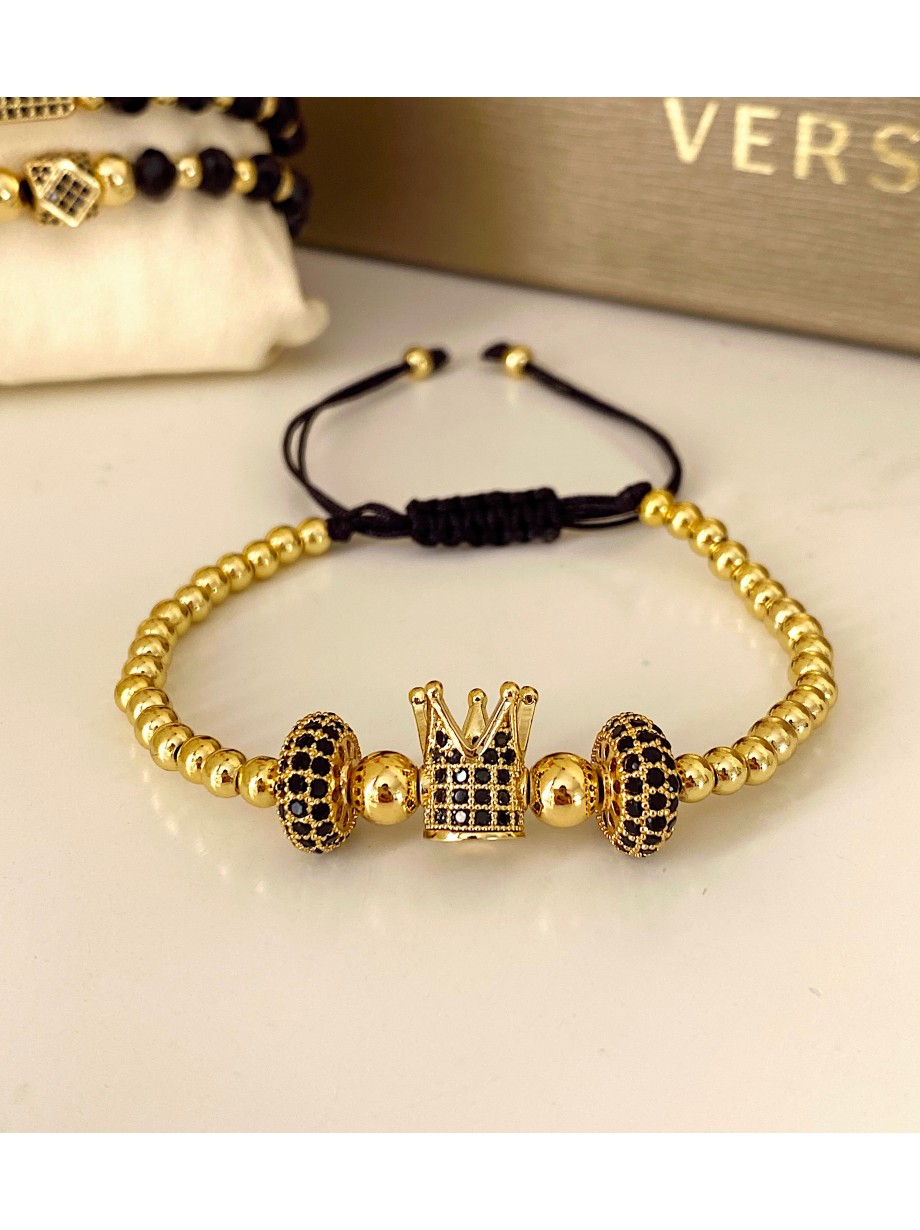 Bratara dama model deosebit cu margele aurii si coroana cu pietricele negre