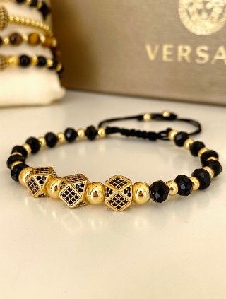 Bratara dama model deosebit cu margele negre si aurii si 3 hexagoane